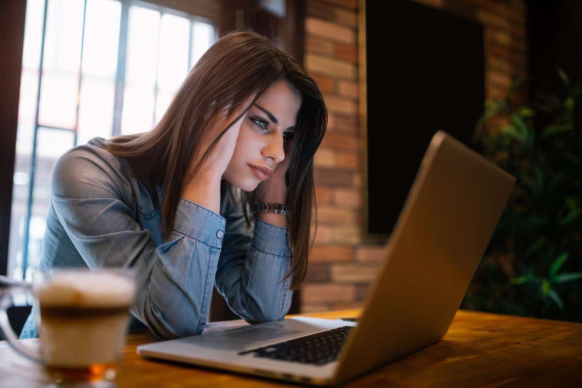 worried woman on laptop