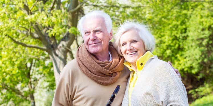 older-couple-outside-umbrella