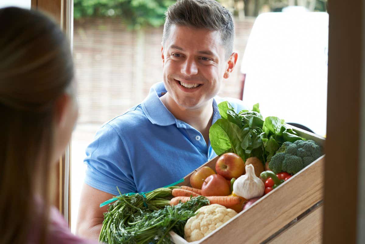 Man delivering a veg box