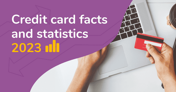 A picture of a person holding a credit card in front of a laptop. The title "Credit card facts and statistics 2023" is written over the top.