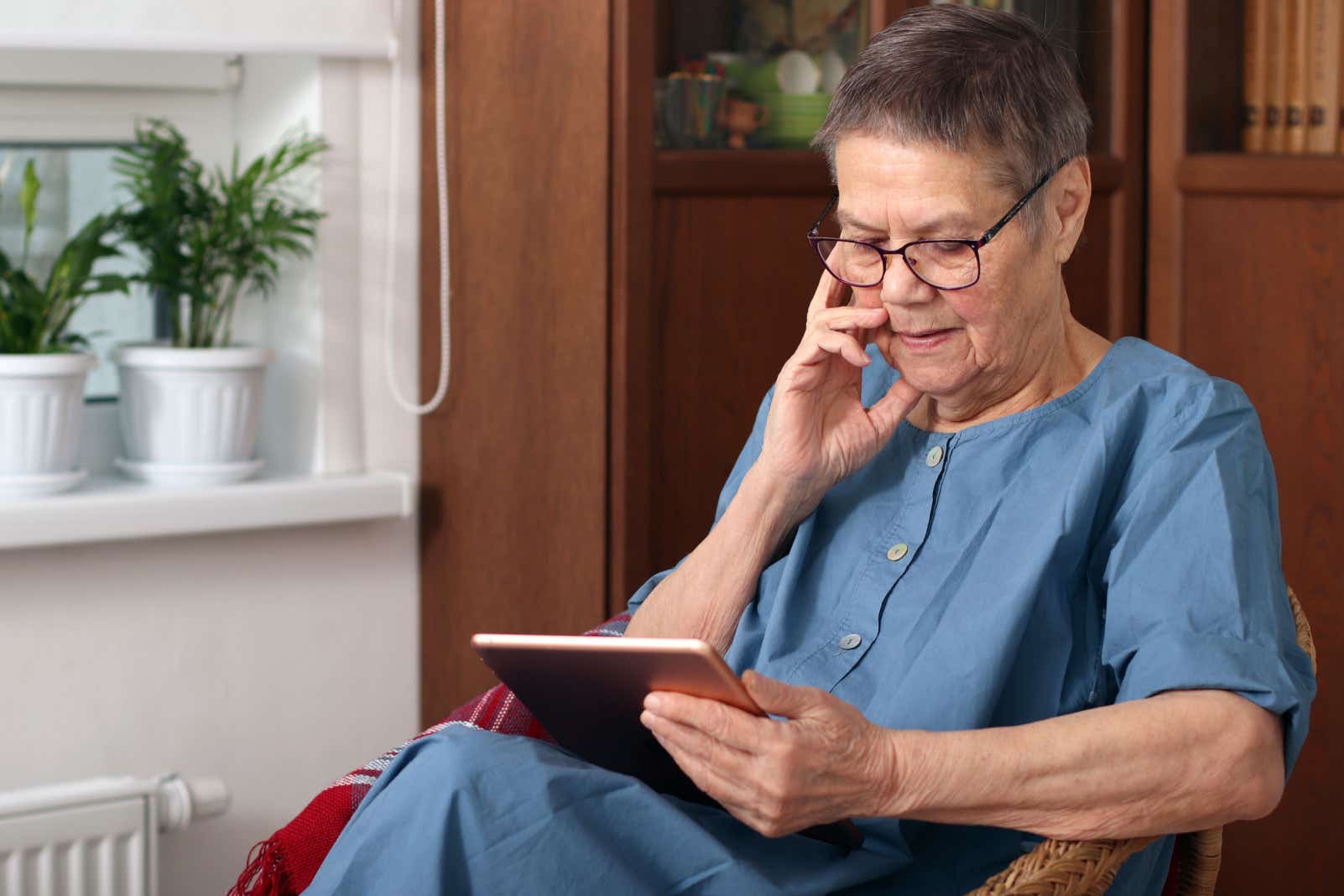 Woman looking at a tablet to set up a standing order