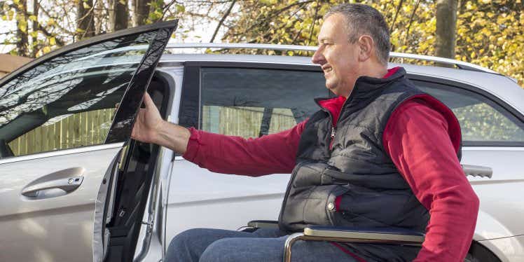 man-in-wheelchair-getting-in-his-car