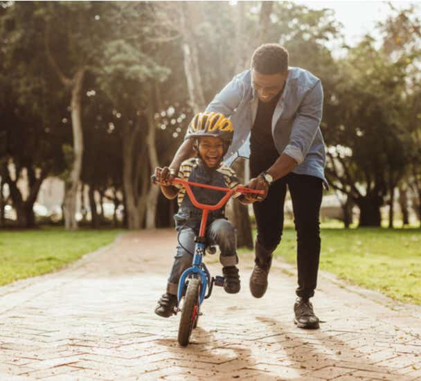 Father and son riding bicycle