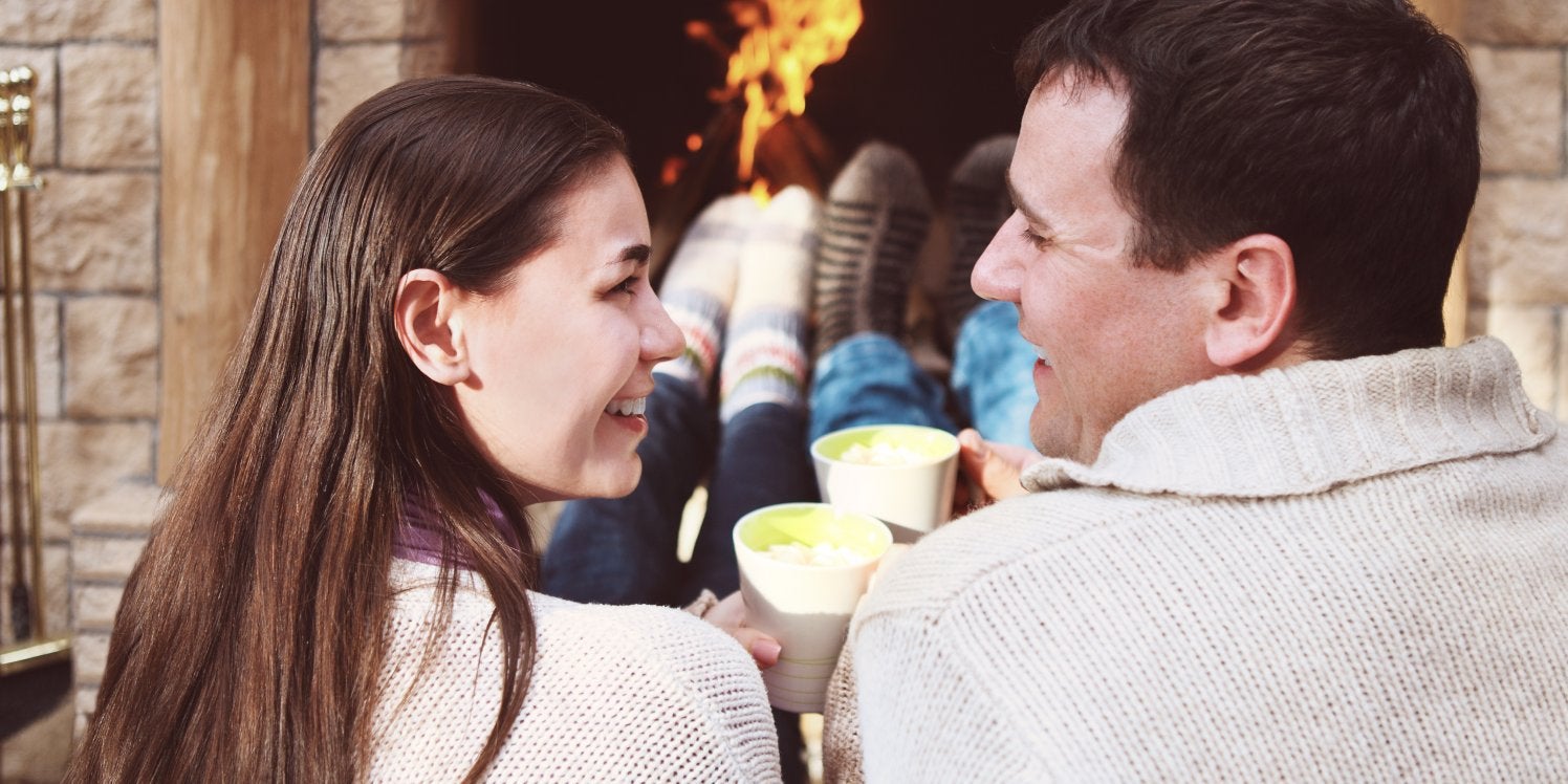 happy-couple-infront-of-fire