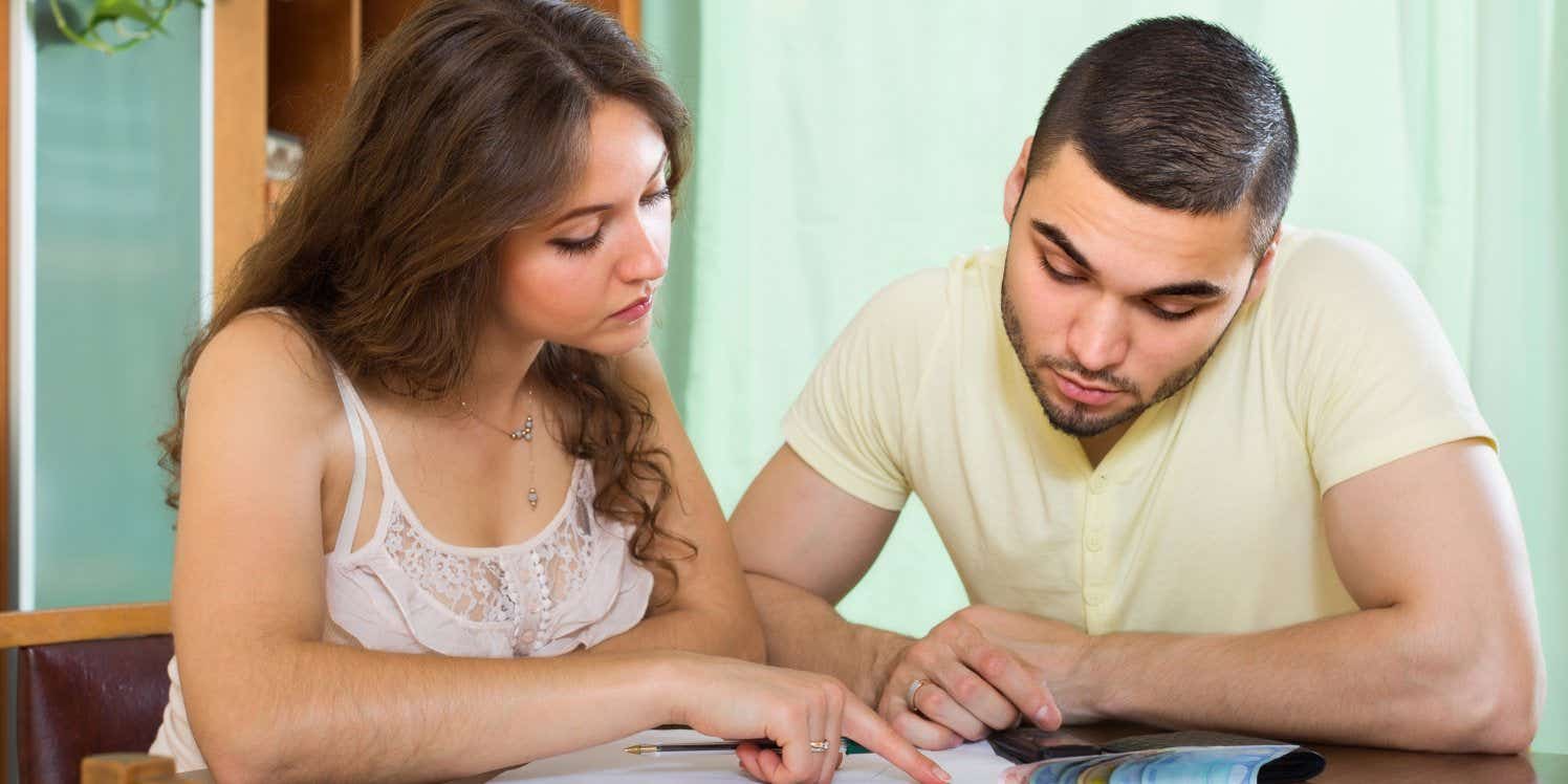 Couple looking at bills