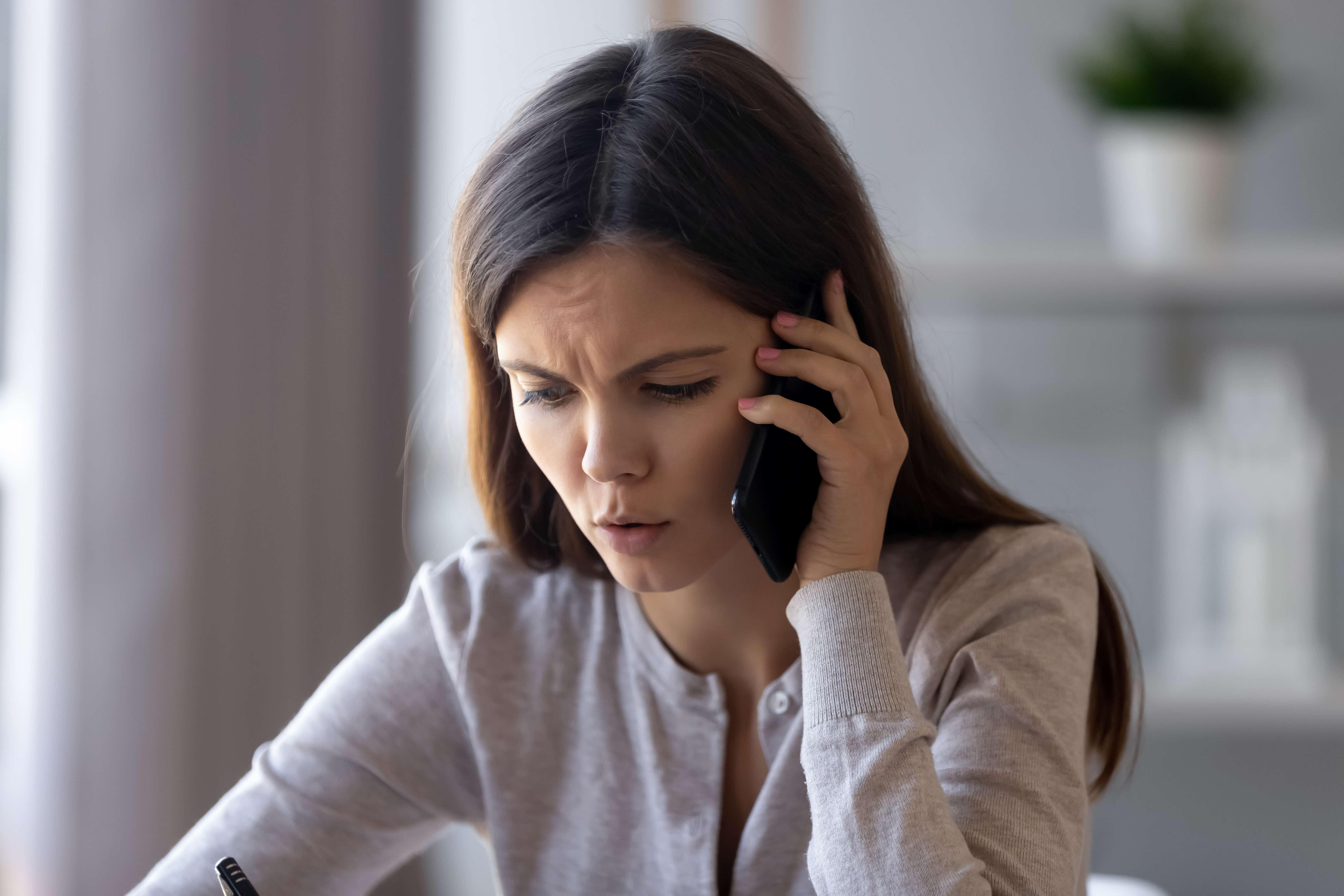 Woman complaining on phone