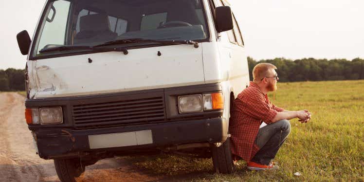 man-sat-by-broken-down-van.CDN5e66117f