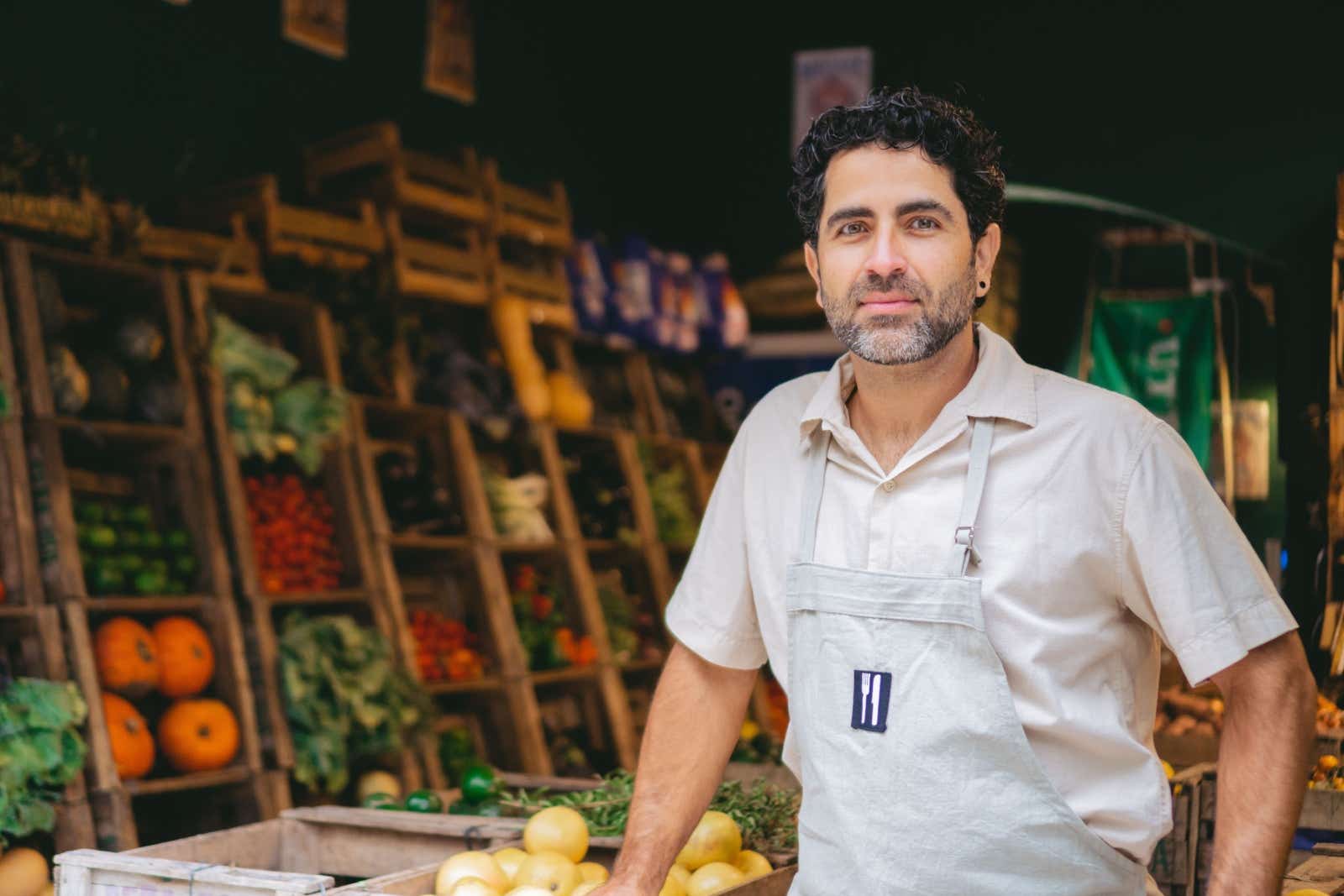 Man working in a fruit and veg shop