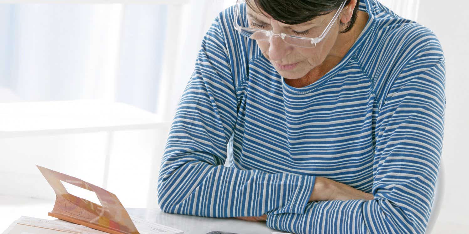 woman-with-calculator-and-paperwork