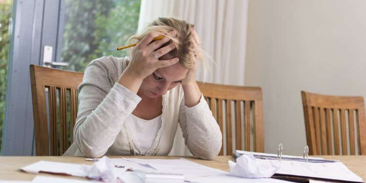 woman-upset-over-bills