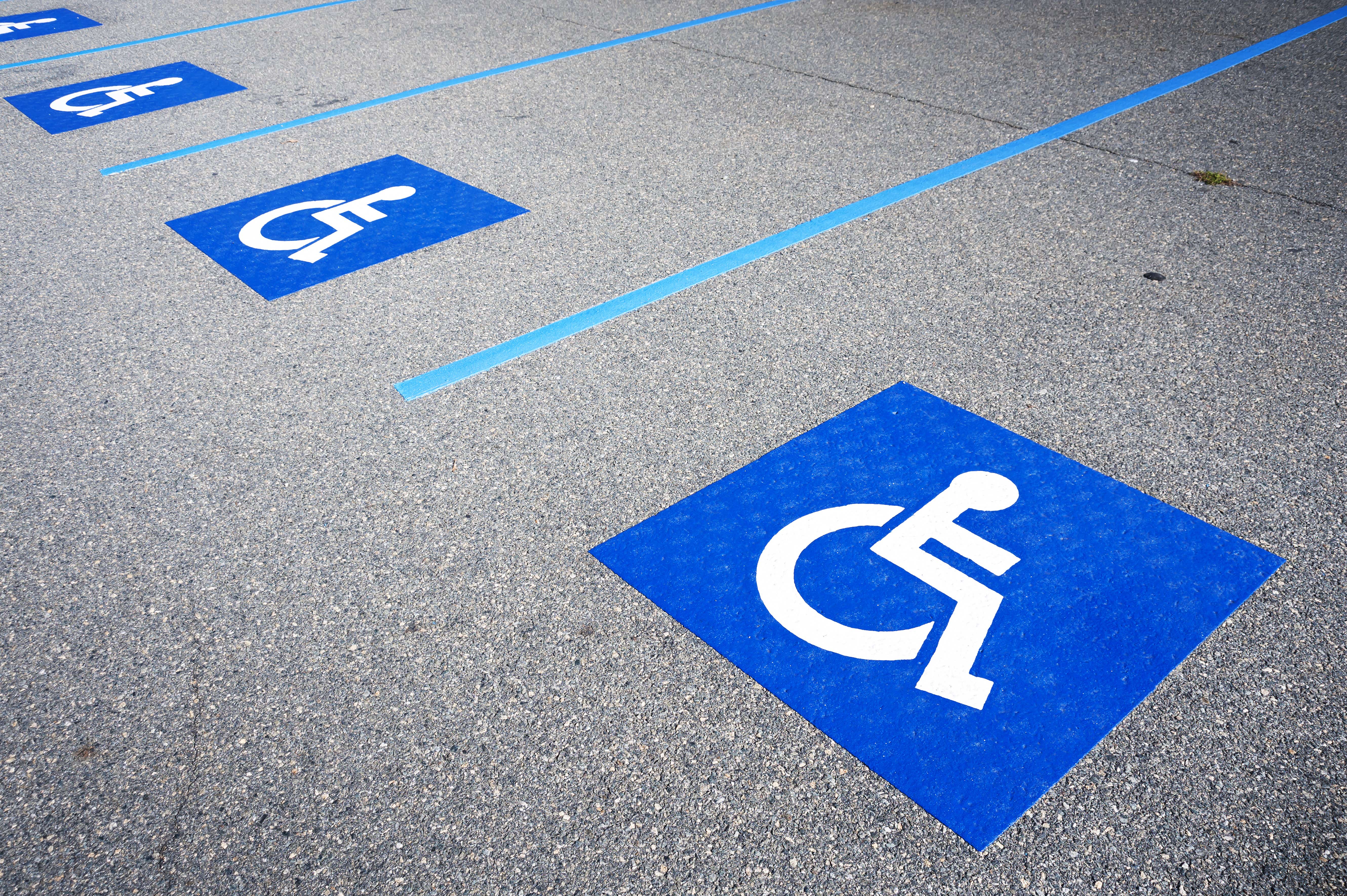 Parking reserved for disabled drivers blue badge carpark