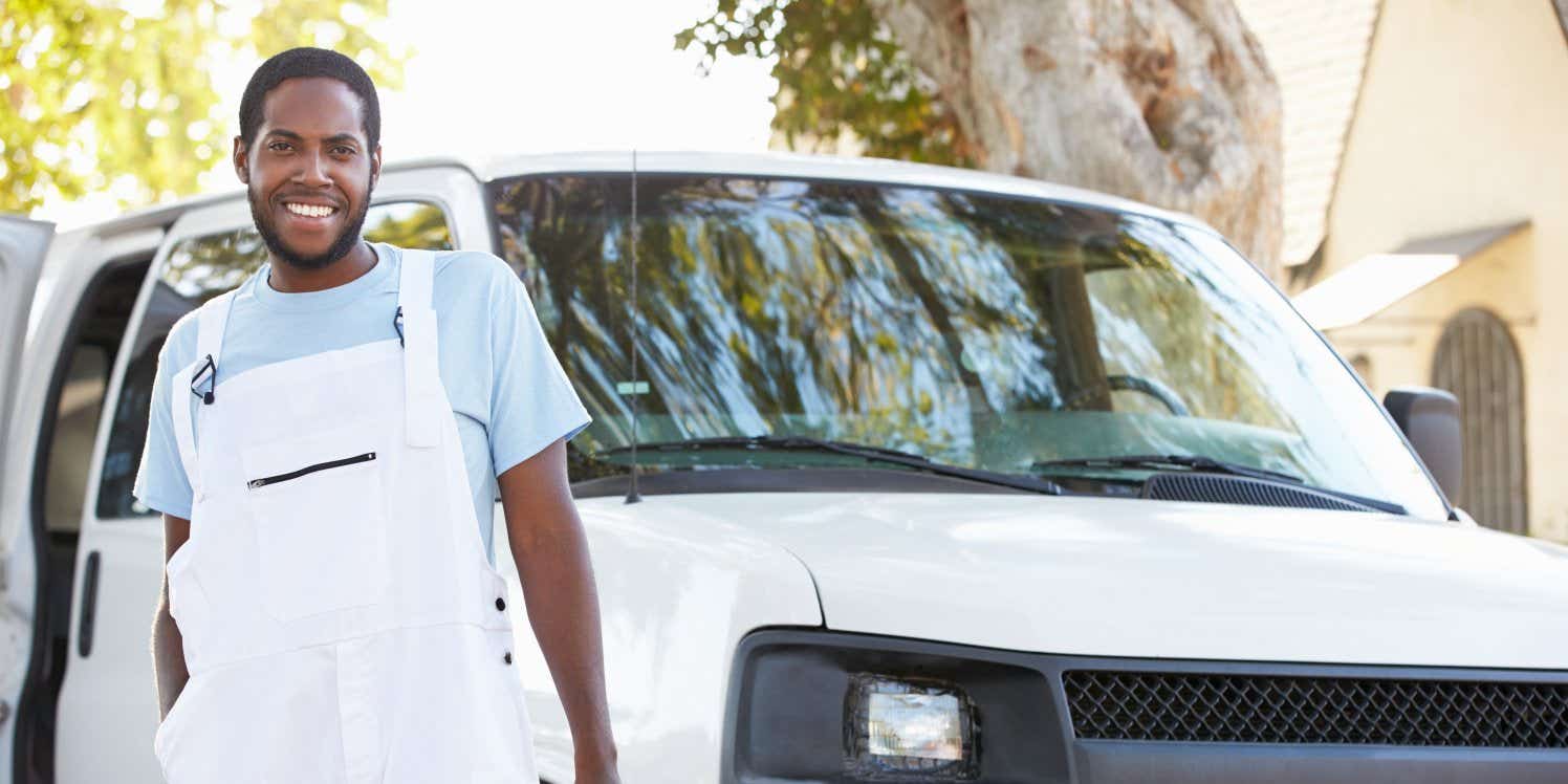 Man standing in front of van