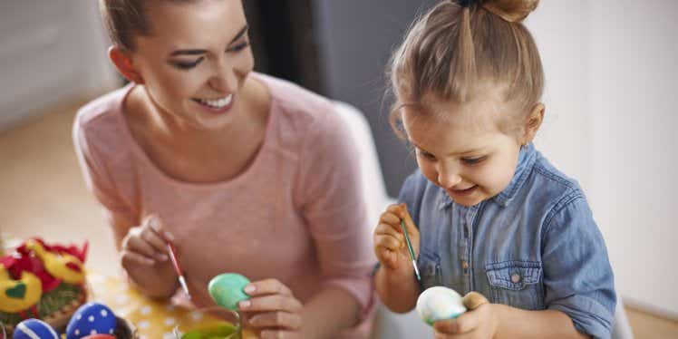 mother-and-daughter-painting-easter-eggs