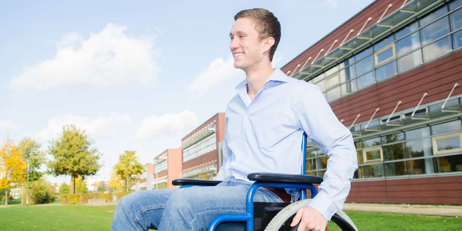 Man in wheelchair smiling