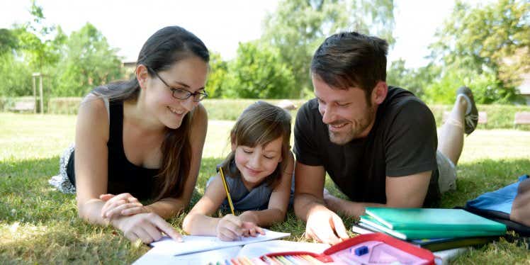 family-outside-paperwork-homework