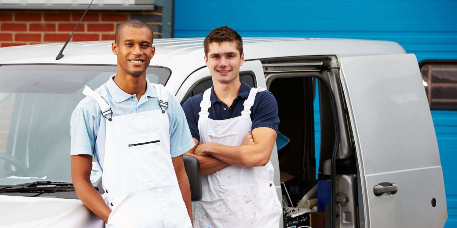 two men outside van