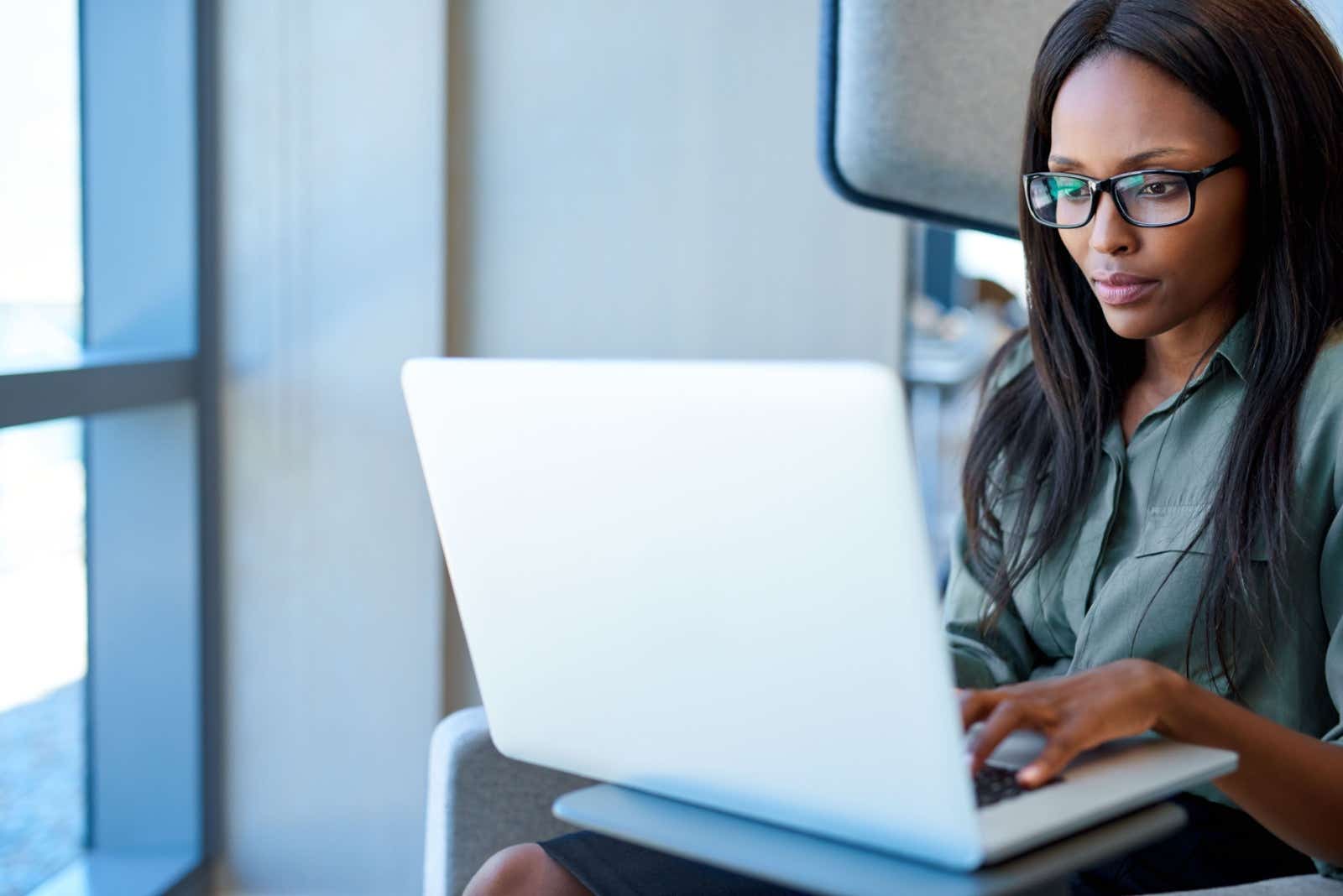 Business owner works on her laptop.