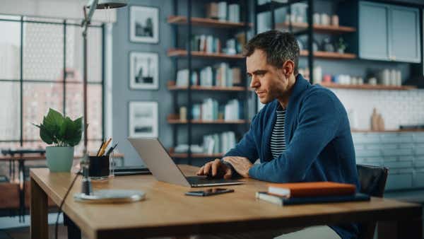Man working from home on his laptop
