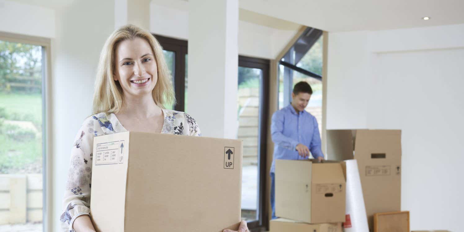 Young couple moving into new house