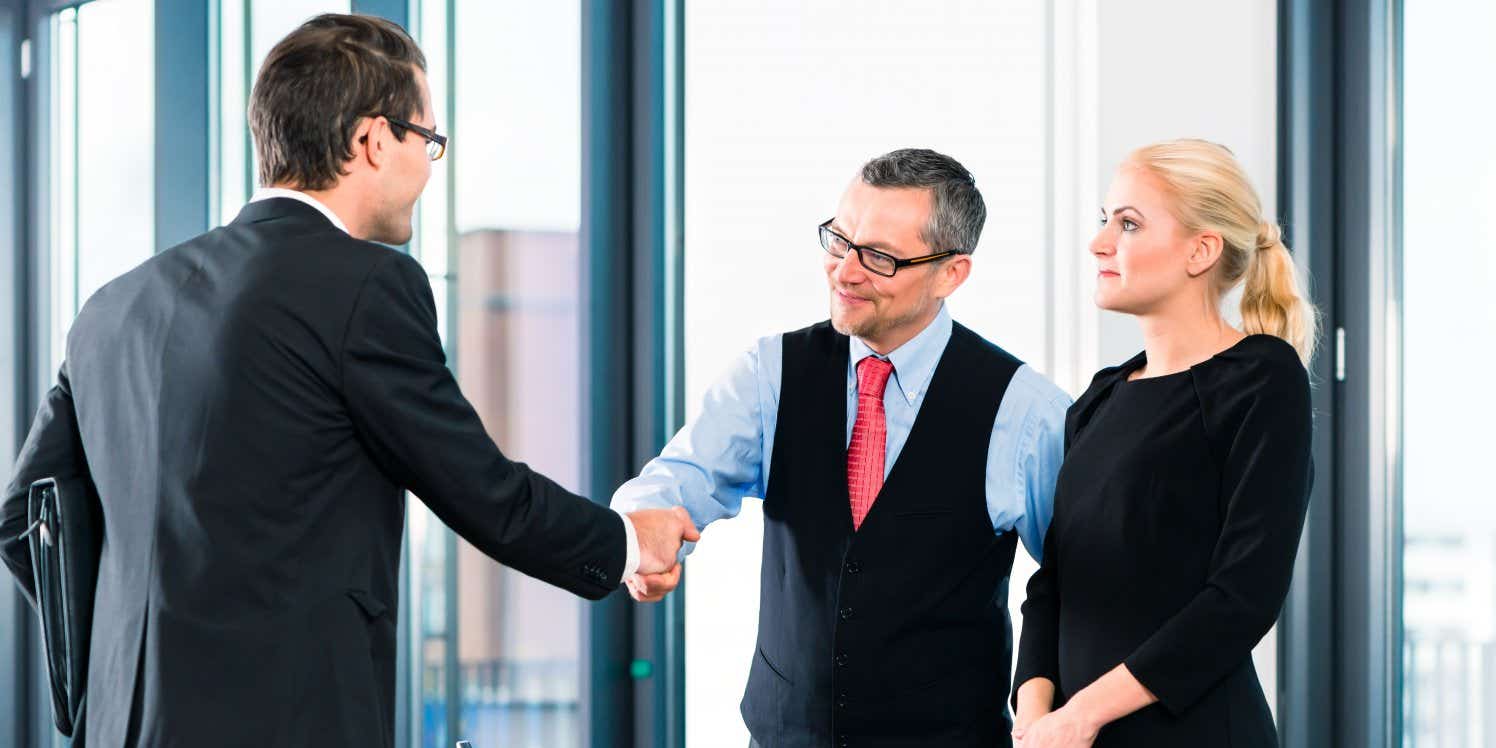 Business people shaking hands