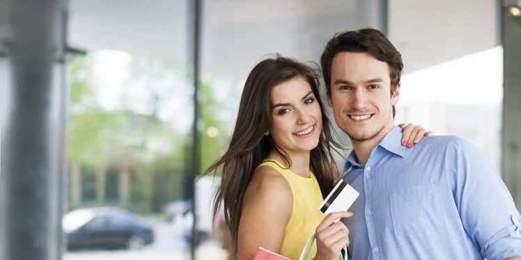 man-and-woman-with-shopping-bags