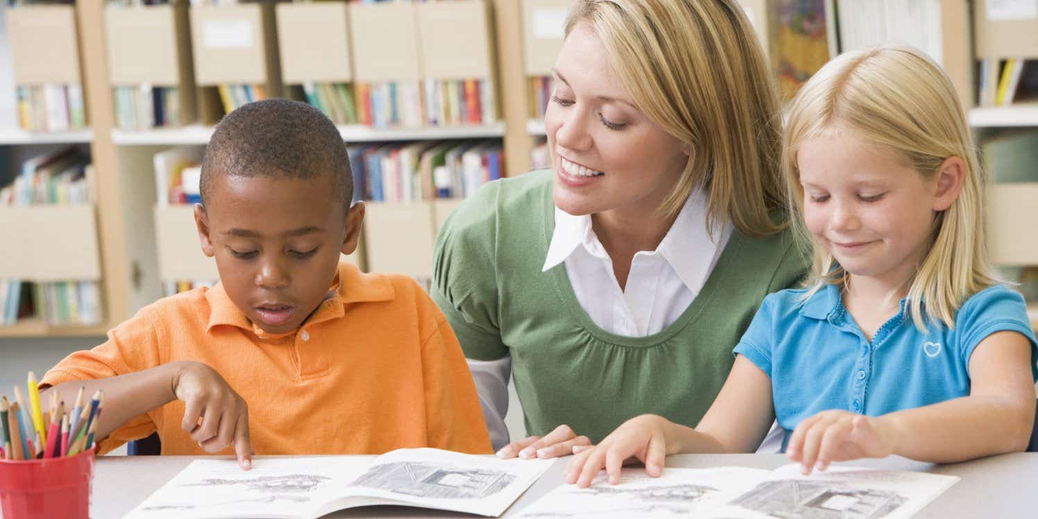 Teacher with two young students