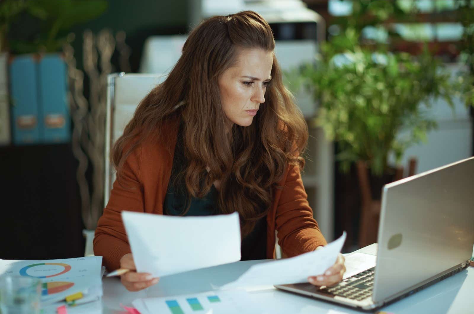 Businesswoman conducting analysis