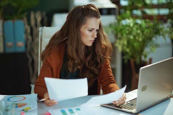Businesswoman conducting analysis