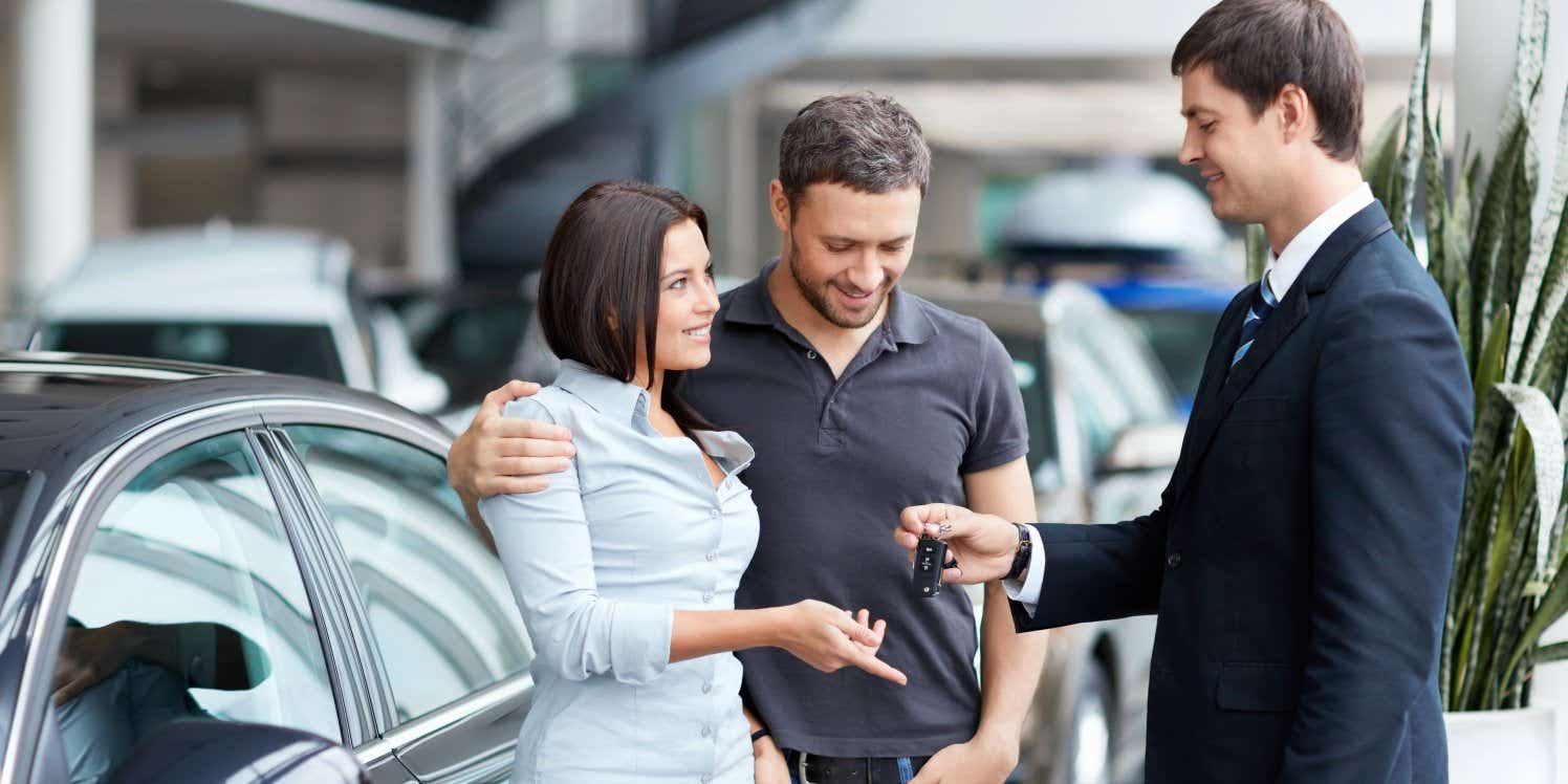 Couple buying car