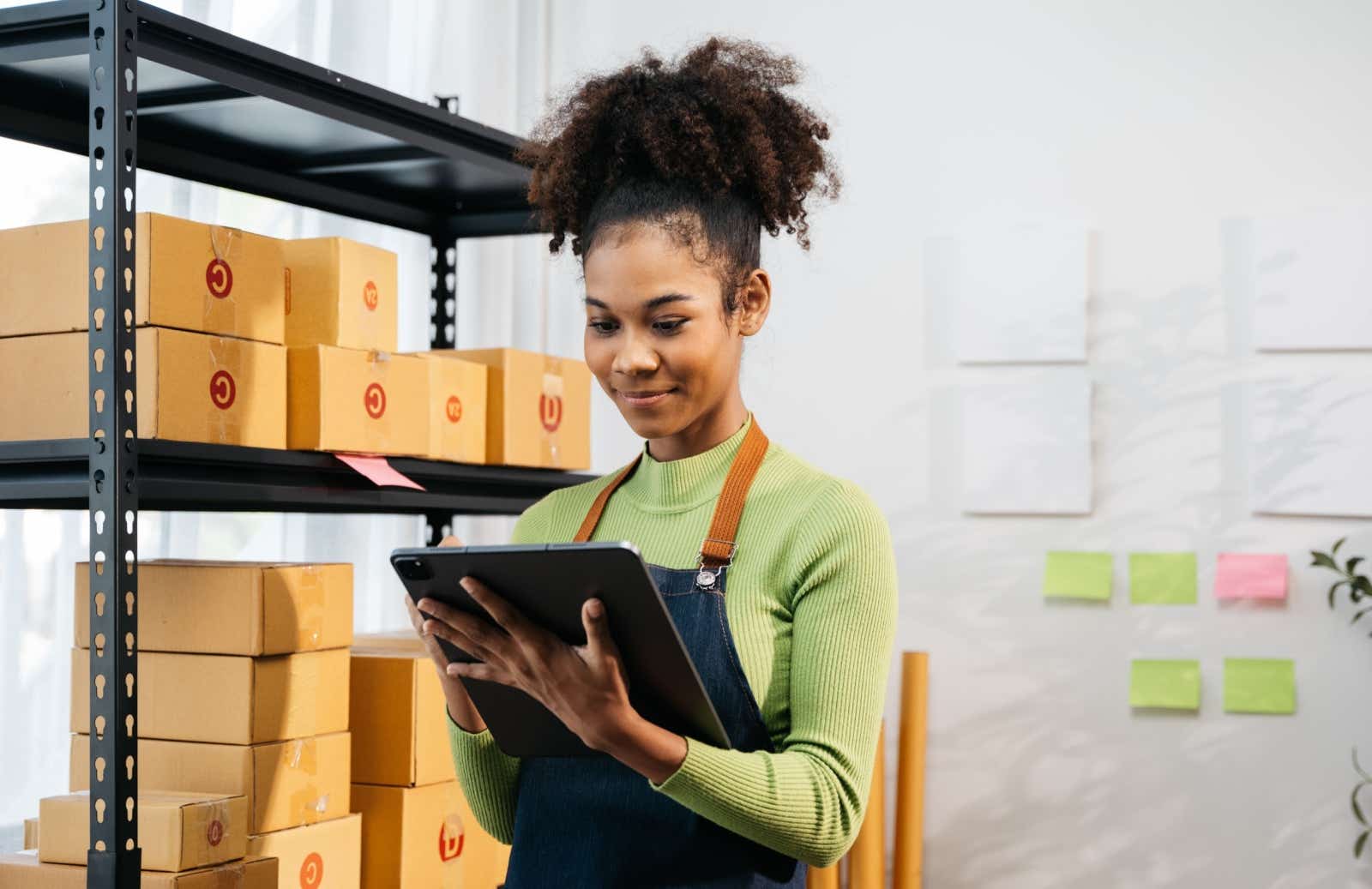 Businesswoman checking her inventory.