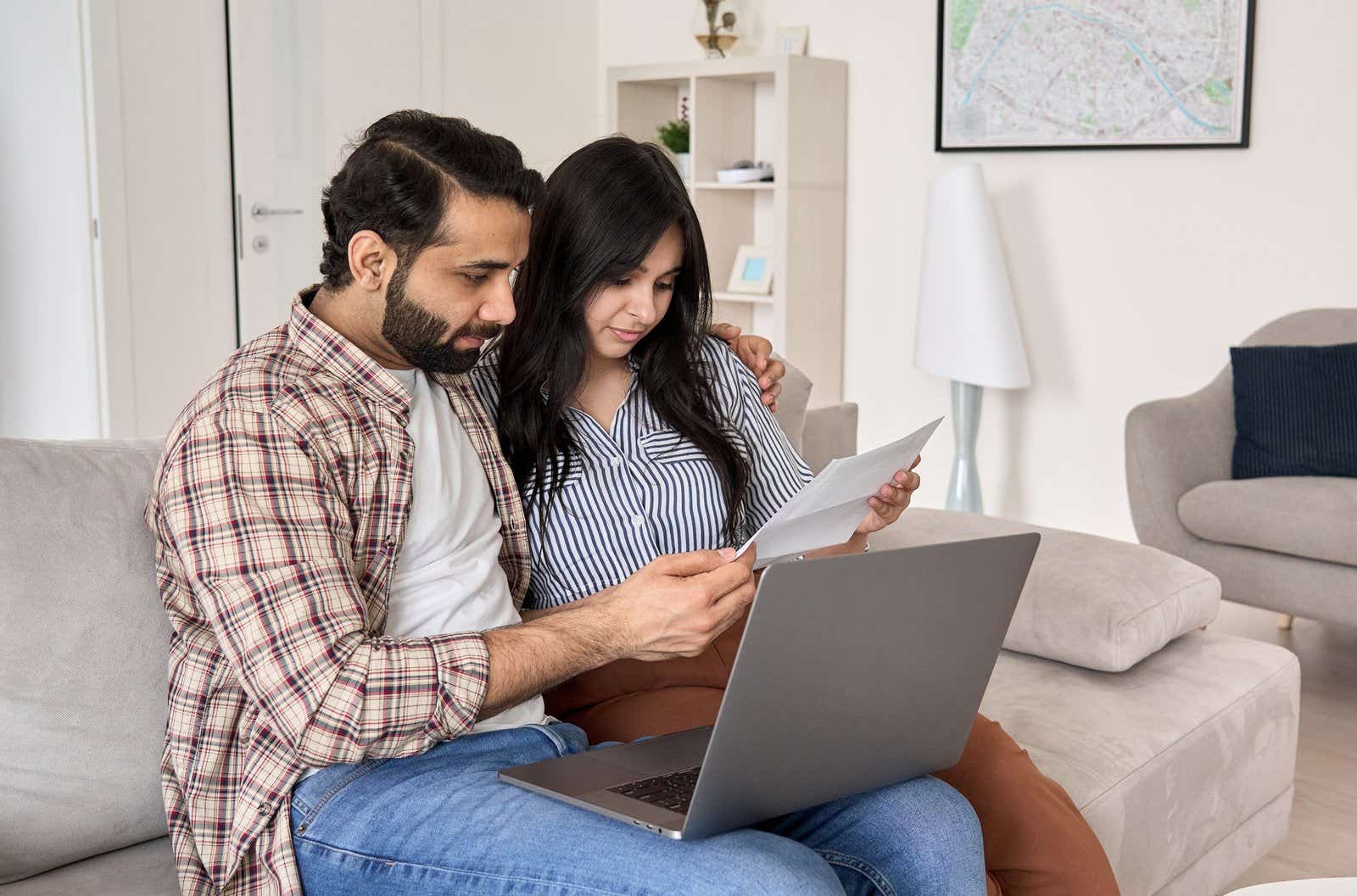 couple working on laptop