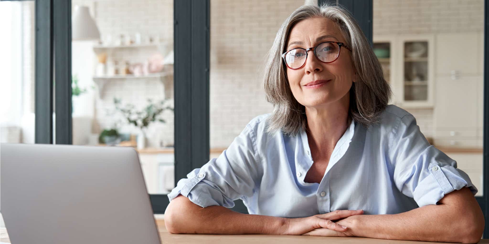 Older woman looking at laptop