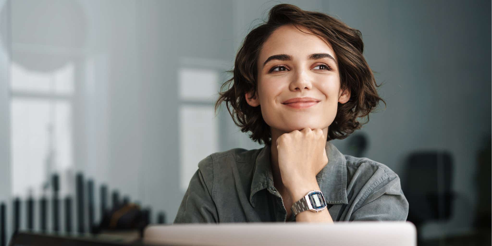 Happy woman at desk