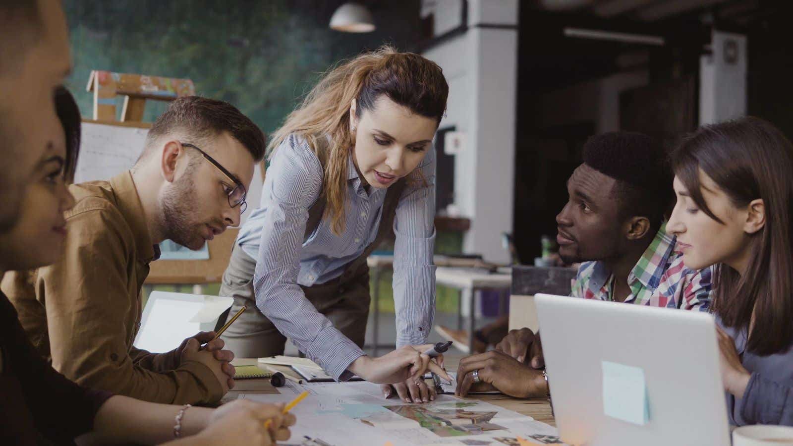 Group of young entrepreneurs working on ideas.