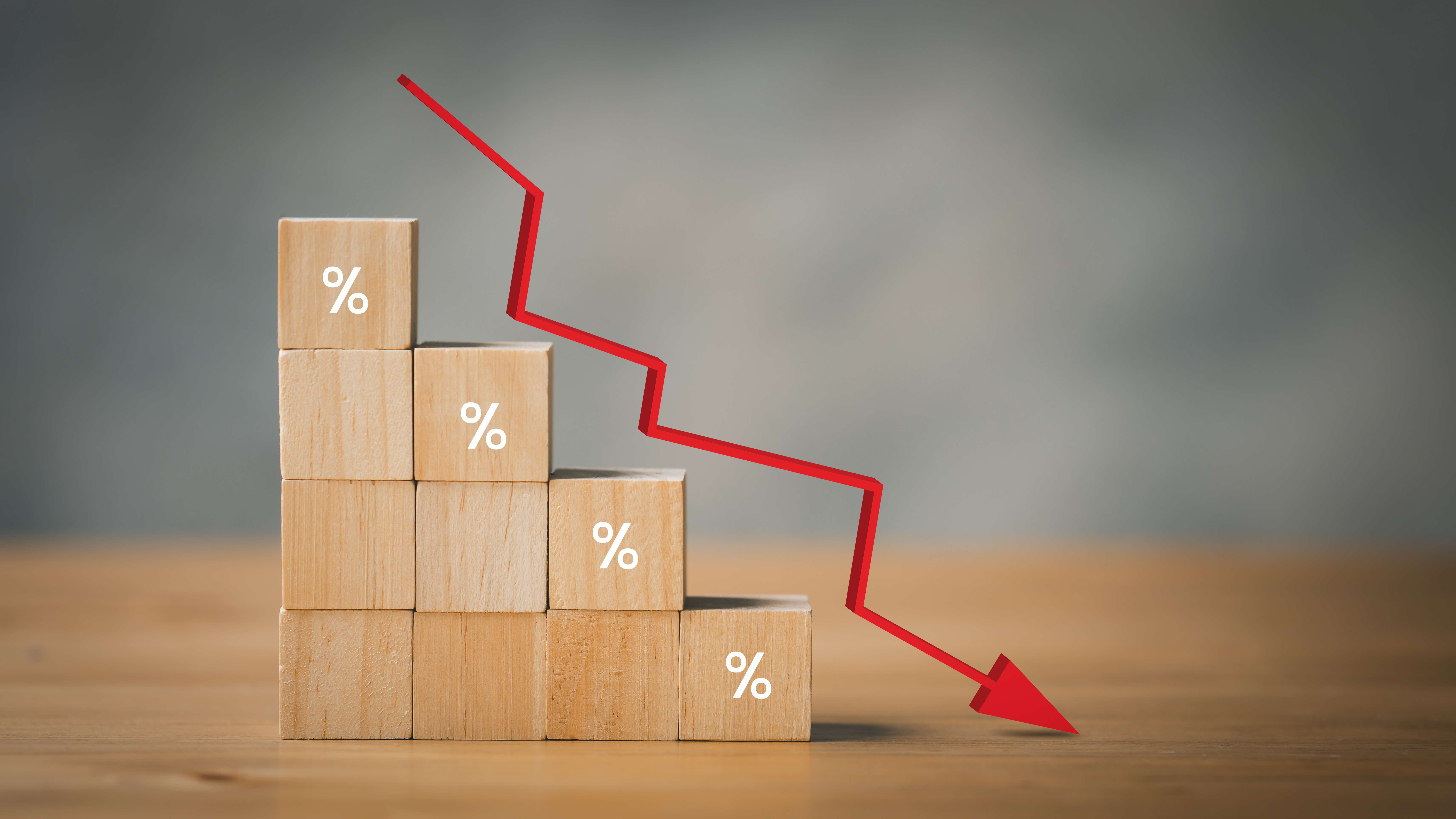 Arrow down from the elements of wooden blocks with percentage sign