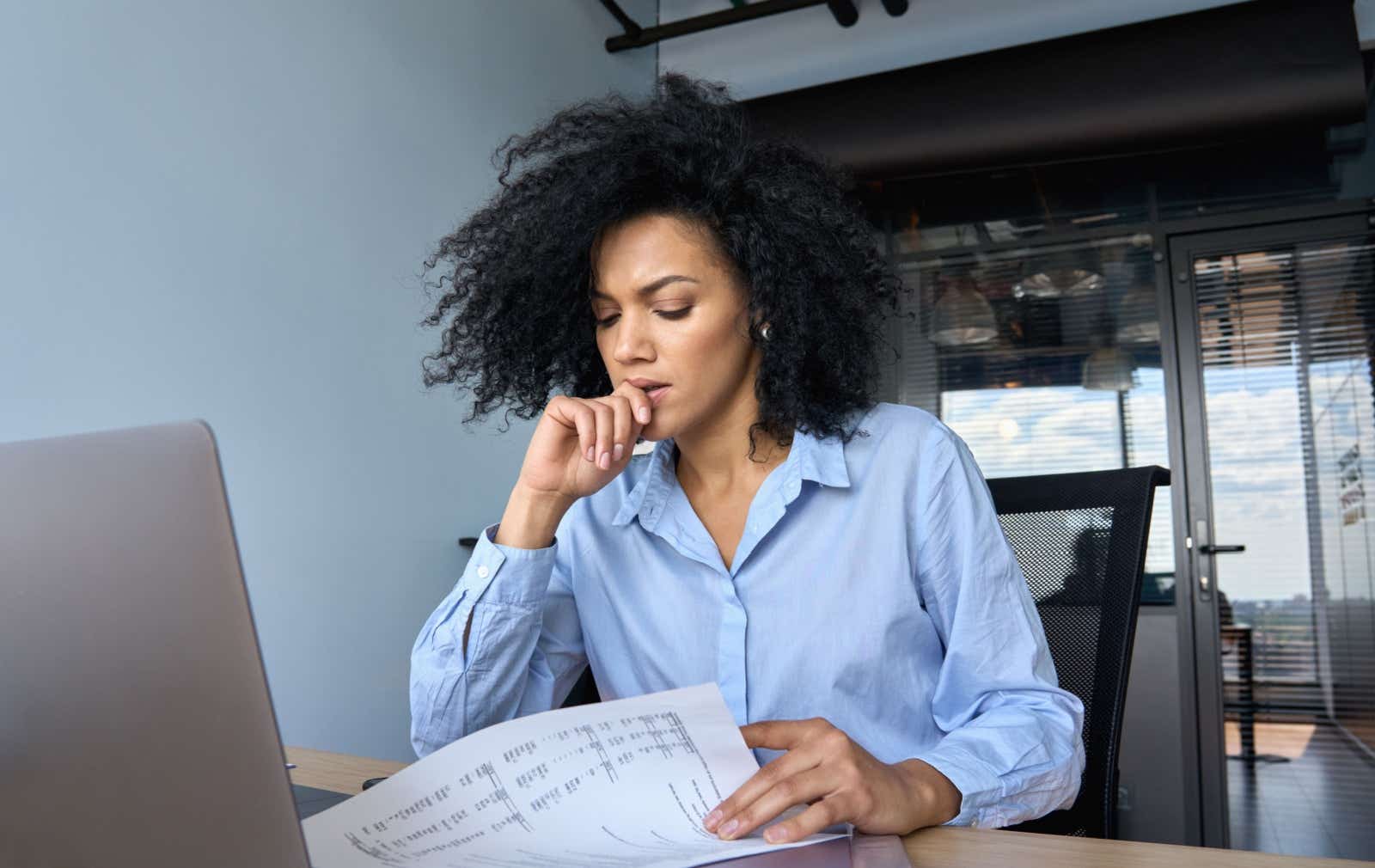 Businesswoman doing paperwork