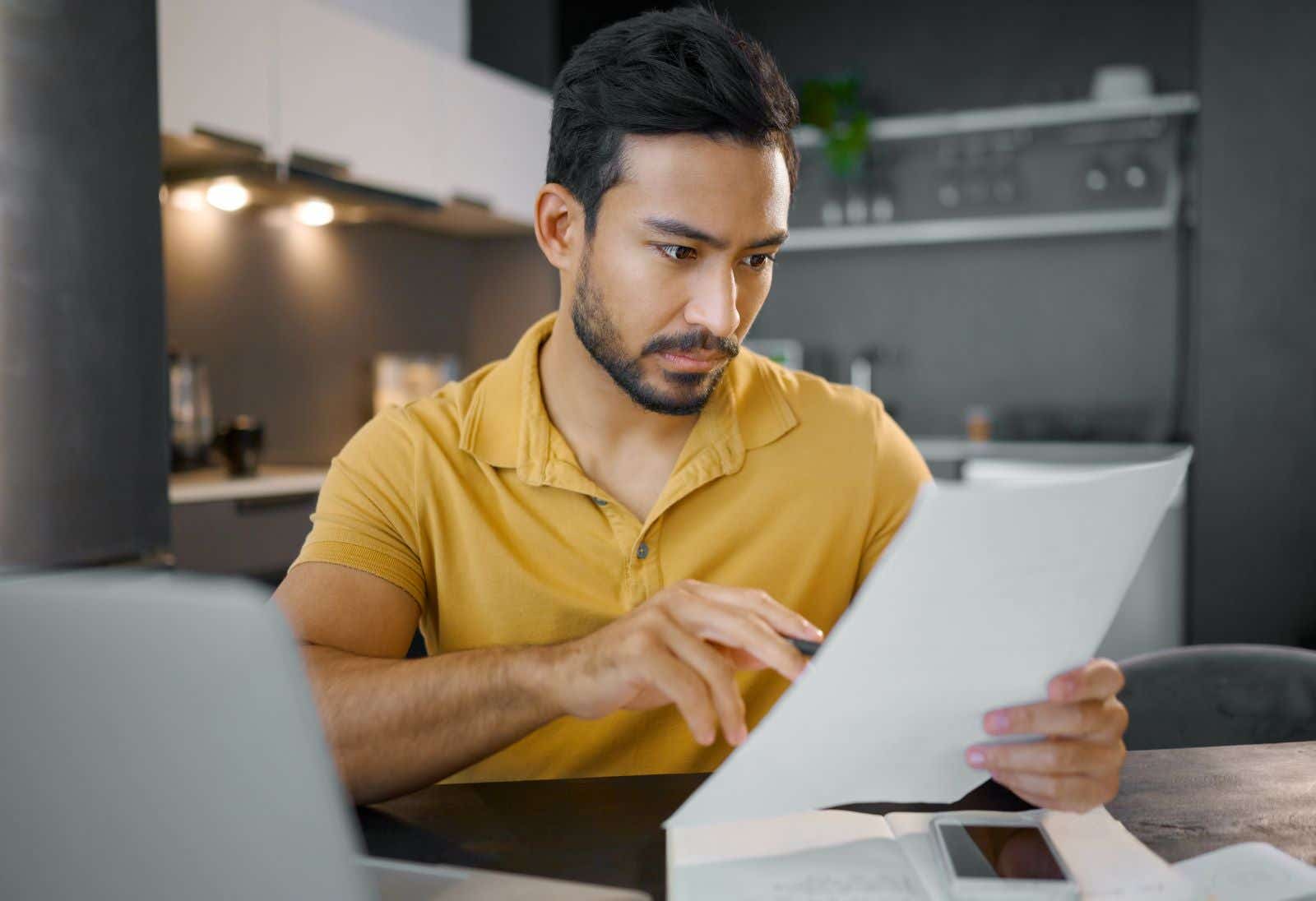 Man studying paperwork