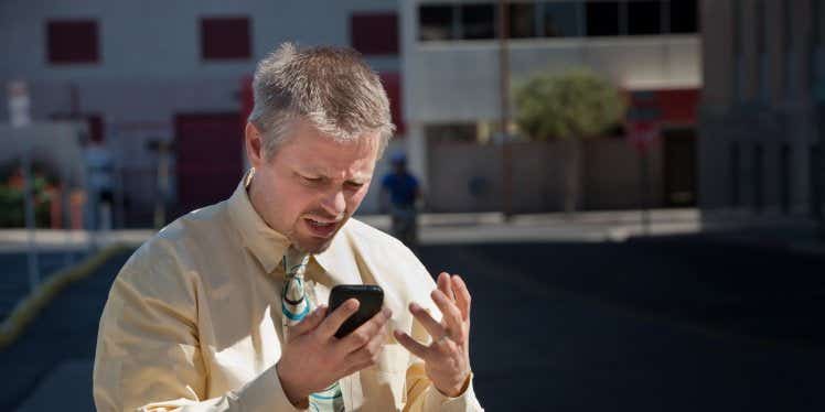 man-phone-outside-angry