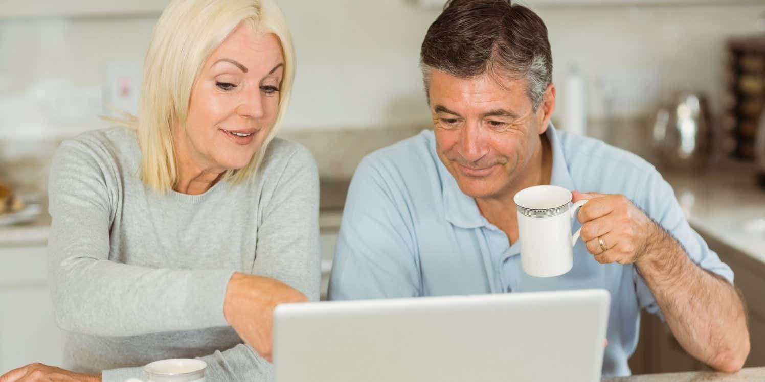 older-couple-looking-at-laptop