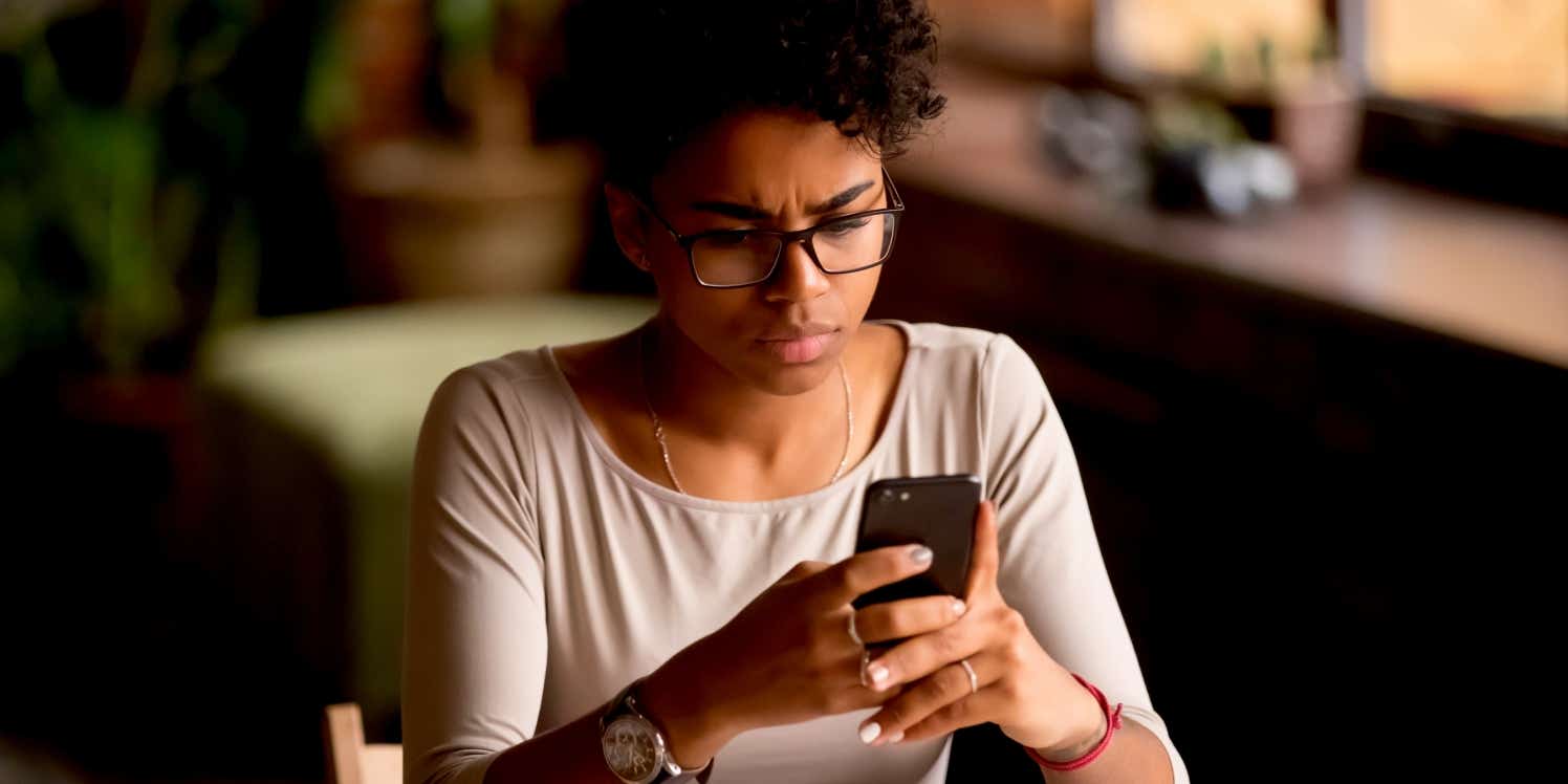 Worried woman on phone