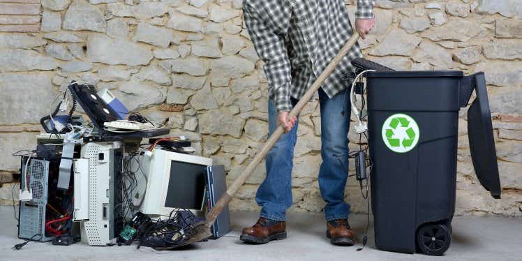 man-recycling-old-computers