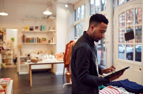 Owner in his retail outlet